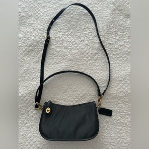 Coach Black and Gold Crossbody Bag with Elegant Design